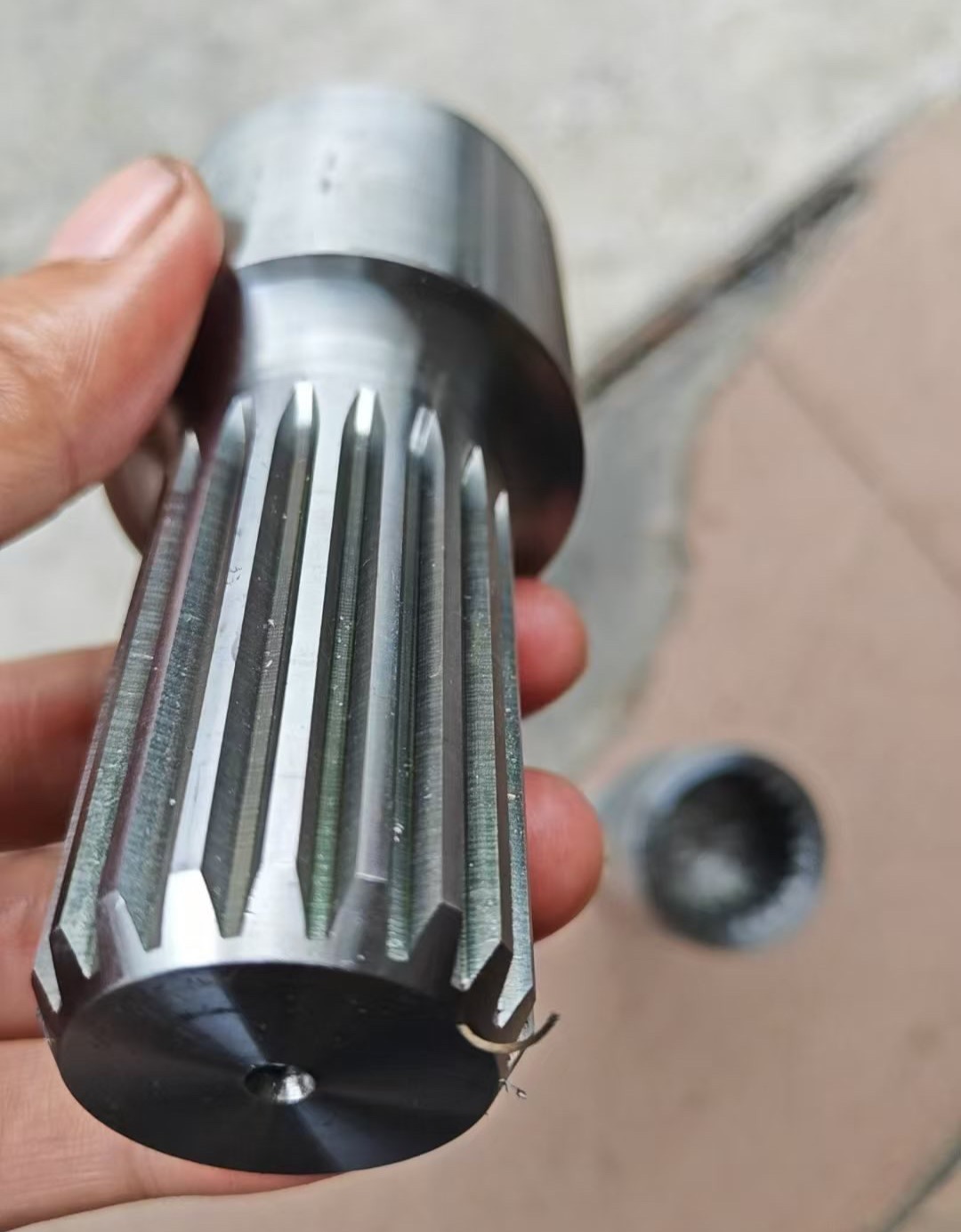 CNC lathe turning a large steel shaft